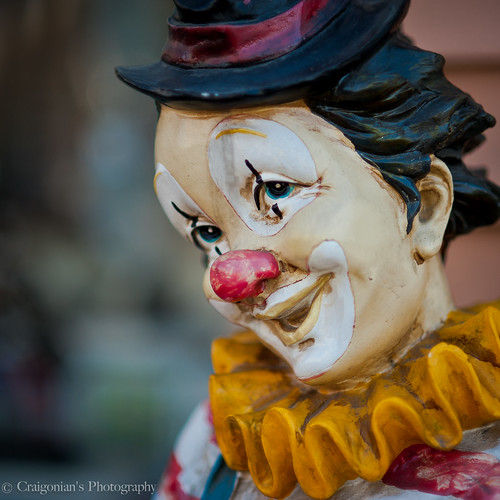 Clown Statue | Old clown statue portrait down an old side st… | Craig