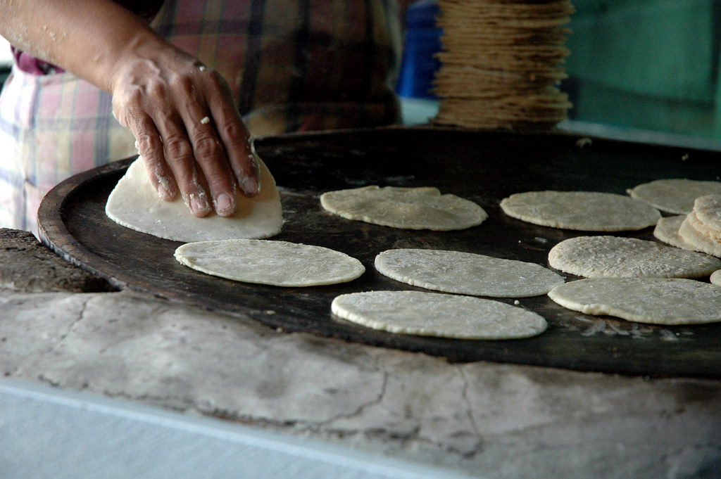 comal | Cooking up a mess of tortillas on a comal. Little Mo… | Flickr