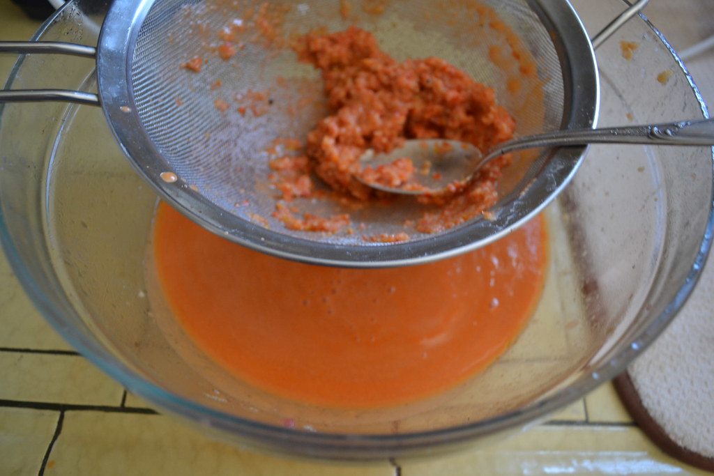 Pour the gazpacho through a fine mesh strainer and use a spoon to press onto the pulp to get as much liquid out as possible. 