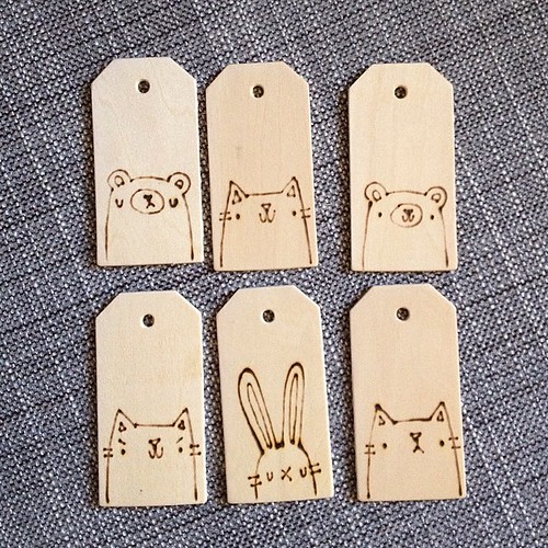 Finalizing some details on these new wooden tags! #migrationgoods #handmade #illustration