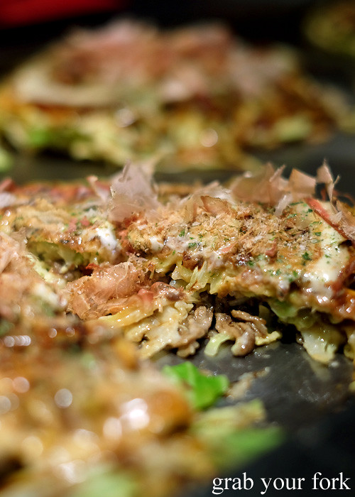 Inside the beef and cheese okonomiyaki at DON in Osaka, Japan