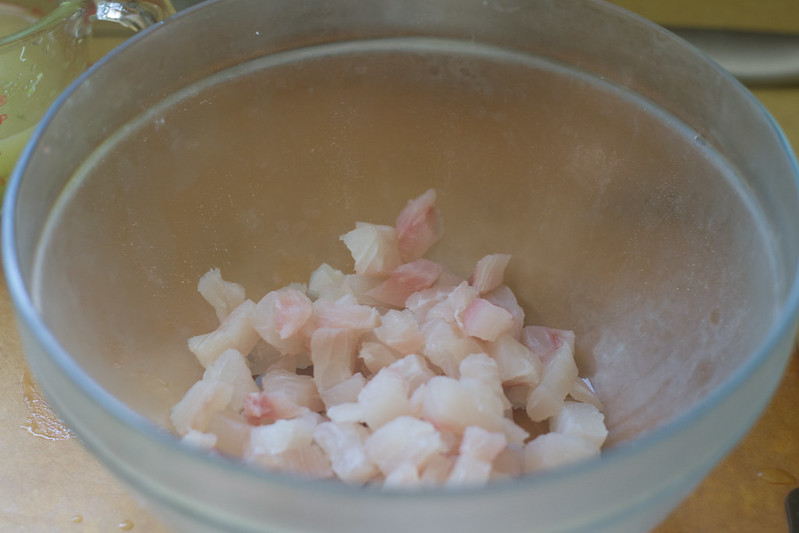Prep the Tilapia for ceviche. Cut out the bloodline and remove any bones, if there are any. Cut tilapia into  small bite sized pieces, about 1/2 inch cubes.