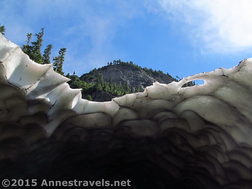 Hole in the roof of the snow cave along the Lake Ann Trail, Mt. Baker-Snoqualmie National Forest, Washington
