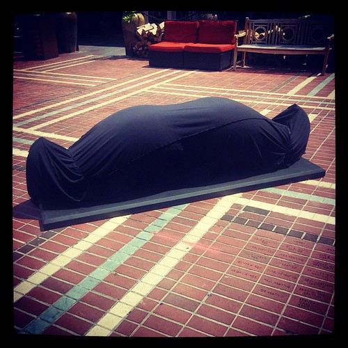 What's up with the big #Reds mustache waiting to be unwrapped in the plaza outside of nada?