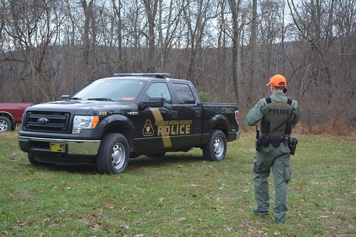 Photo of Maryland Natural Resources Police officer and vehicle