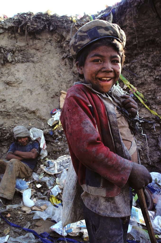 Scavenging at the dump, Guatemala, 1985 | by Marcelo  Montecino