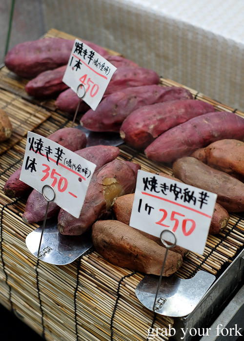 Baked sweet potatoes at Kuromon Ichiba Market in Osaka, Japan