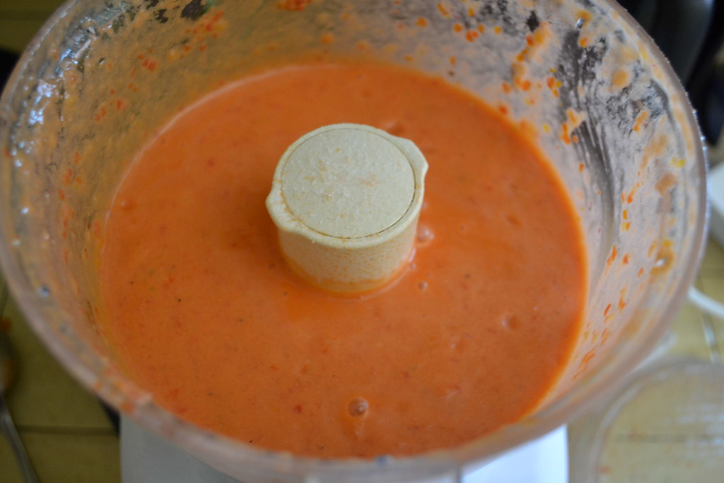 Add gazpacho mixture to a food processor or blender and blend until pureed well and there are no large pieces left over. Add a few dashes of red wine vinegar, taste for seasoning and adjust as needed.