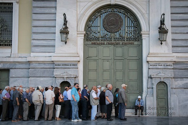 Greek Crisis Pensioners queue outside banks for ration payout