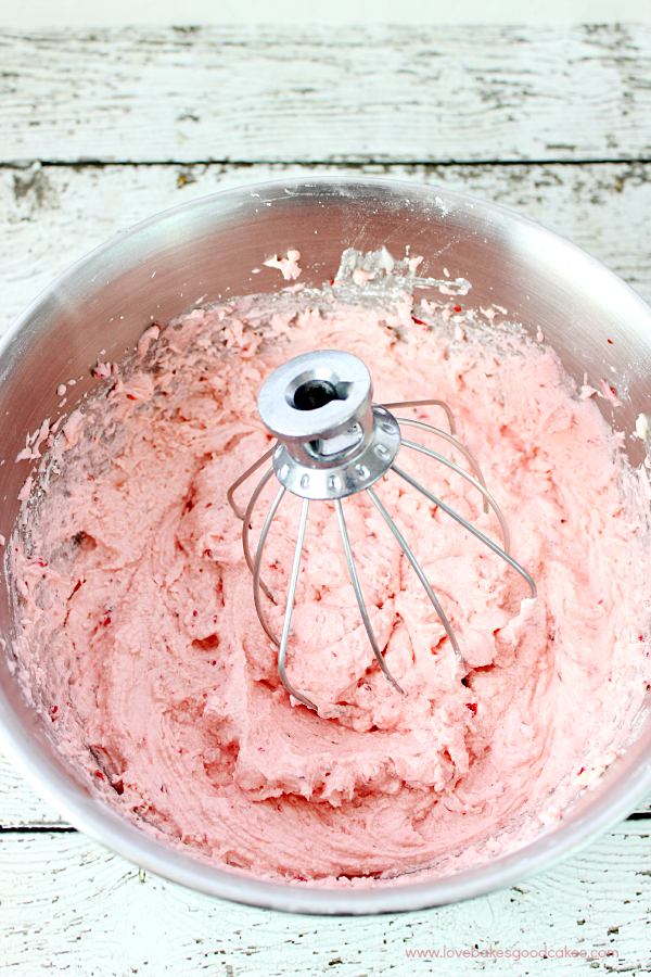 Strawberry Buttercream Frosting in a mixing bowl.
