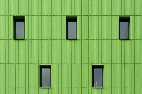 Five windows in a green wall