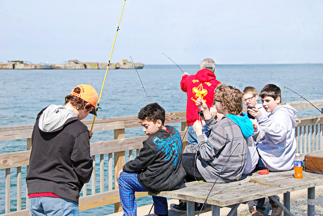Boy Scouts on a fishing outing at the Fishing Pier at Kiptopeke State Park,Virginia