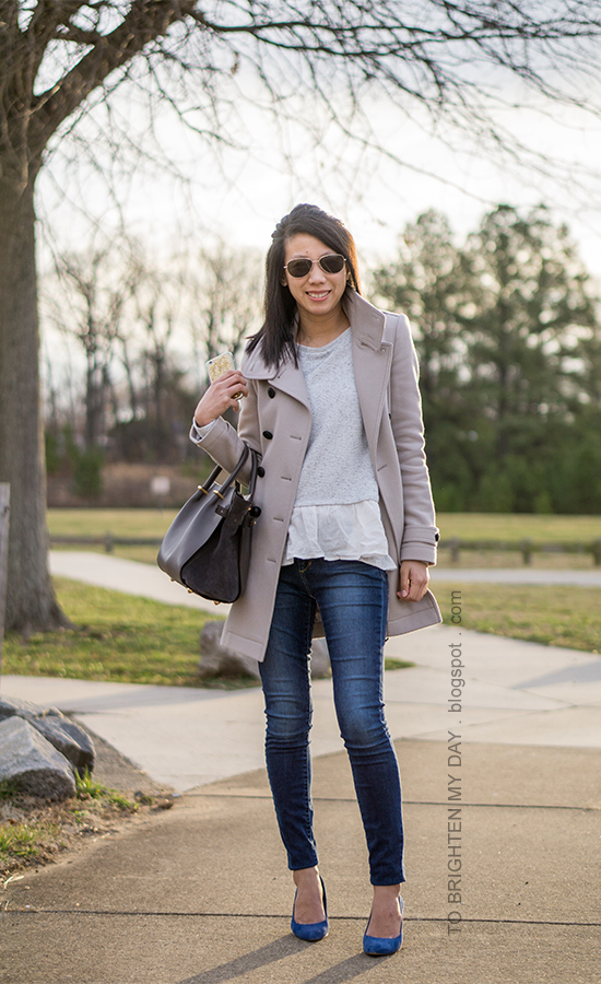 gray wool trench coat, gray ruffled sweater, skinny jeans, gray tote, blue suede pumps