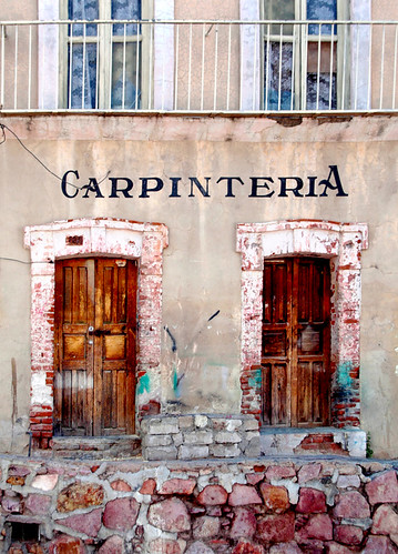 Old wall with wooden doors in Zacatecas, Mexico