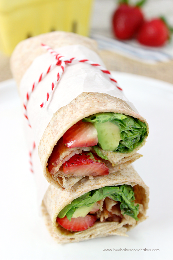 Bacon, Avocado & Strawberry Wraps stacked on top of one another.