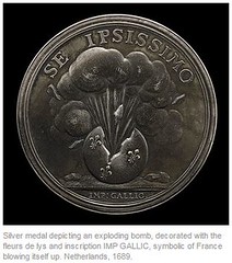 Silver medal depicting an exploding bomb