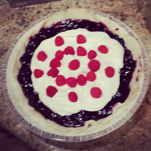 Fresh blueberry pie with raspberries