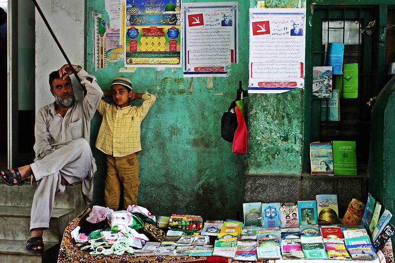 A street vendor in Sonwar Srinagar  is selling Islamic books.