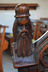 bench end: man in a hat (15th Century)