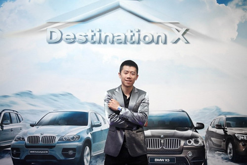 Xia Yu Huang Lei wearing a BMW watch power trip to 2010BMW x