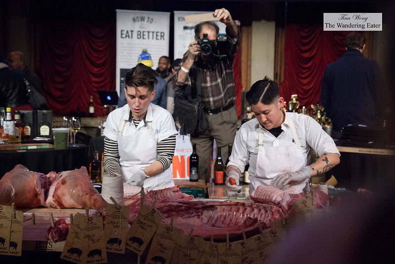 Jocelyn Guest and Erika Nakamura of White Gold Butchers breaking down a whole pig for charity auction