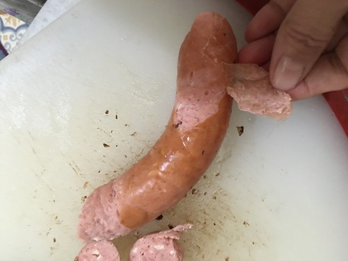 peeling off sausage skin