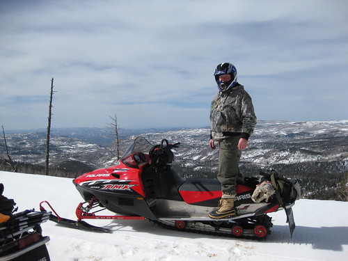 A man on an over-snow vehicle
