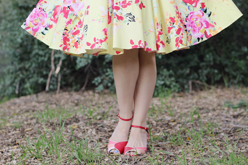 The Pretty Dress Company Hepburn in Lemon Seville Bettie Page Shoes Abela Heel in Red