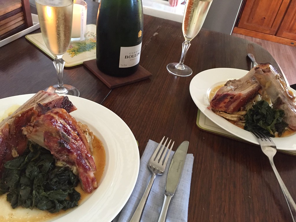 deluxe dinner of slow roasted pork belly and fennel, mashed potato and homegrown rainbow chard