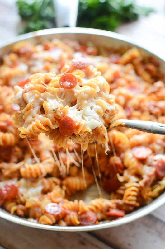 One Pan Pizza Pasta - pasta cooked with Italian sausage, tomato basil sauce, pepperoni, and lots of cheese. Easy weeknight dinner the whole family will love!