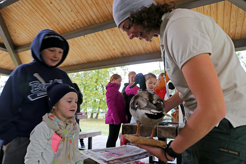 As the traveling Forest Service representative, Teresa Butel helped facilitate the migration station by talking to students about different native bird species (Photo Credit: Julia Schwitzer, Wilderness Inquiry). 