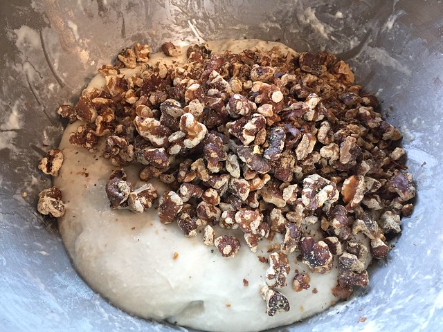 Mixing toasted walnuts
