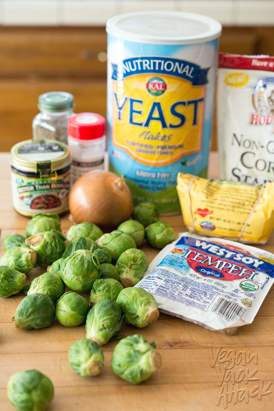 ingredients for vegan quiche with Brussels sprouts in the foreground