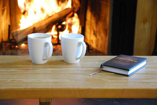Coffee and devotions together in front of a roaring fire at cabin 5 Lake Anna State Park, Virginia