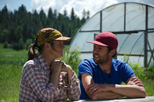 Ben Ferencz and Julie Pavlock of Foothills Farm in St. Ignatius, Montana with their hoop house in background