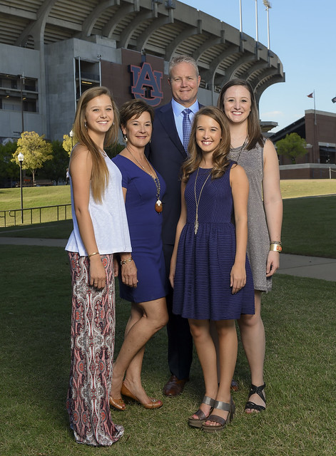 Jay Jacobs poses with his family outside Jordan-Hare Stadium.
