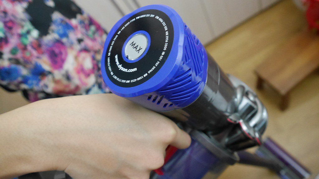 This is the post-motor HEPA filter which can be removed and washed. There's a button for MAX power mode, which provides 6 minutes of extra powerful suction for more challenging tasks. 