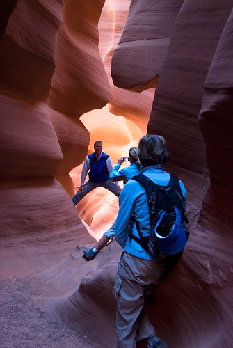 The swirling curved rock formations of this 'slot' canyon were created by the force of water through sandstone during flash floods over the millenniums