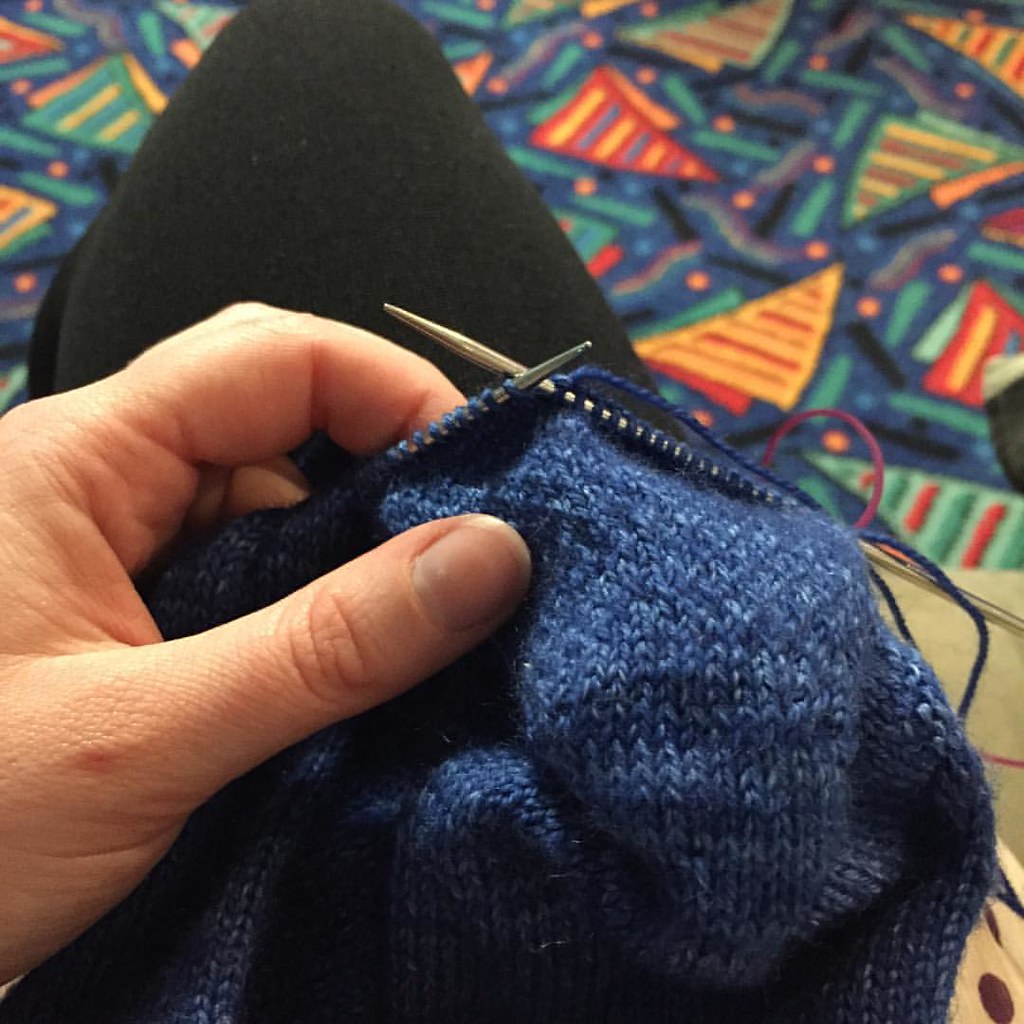 working on my blue tip top toe socks in the pokie room with incredibly loud carpet in the background