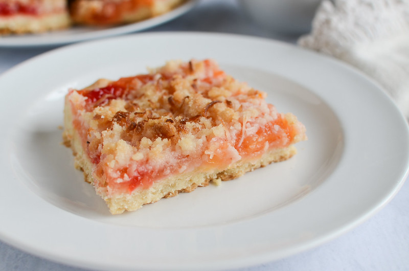 Ambrosia Streusel Bars - a shortbread crust with a pineapple, orange, and cherry filling and topped with delicious coconut streusel!