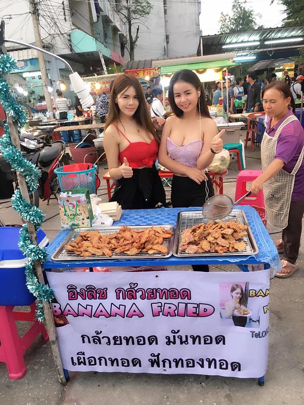 sexy thai girl selling fried banana night market