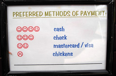 A sign discussing payment options.