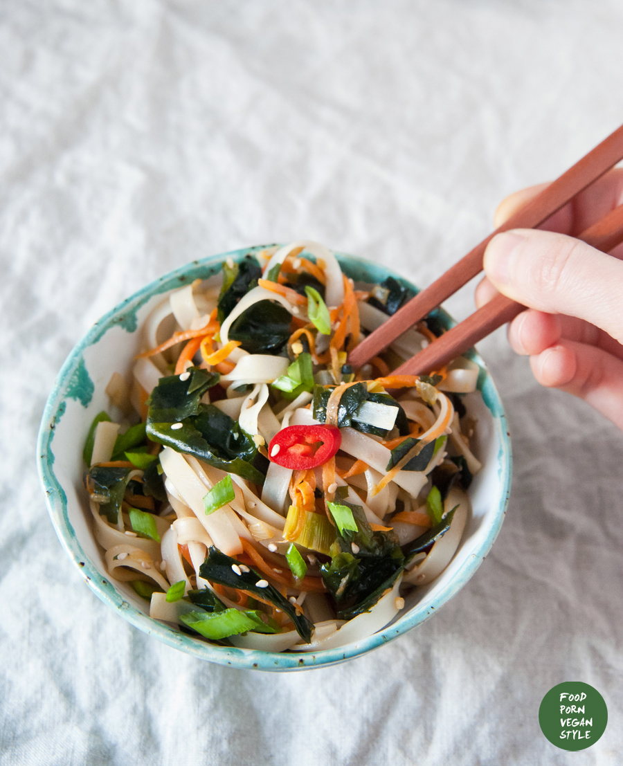 Vegan stir-fry with wakame seaweed, vegetables and rice noodles