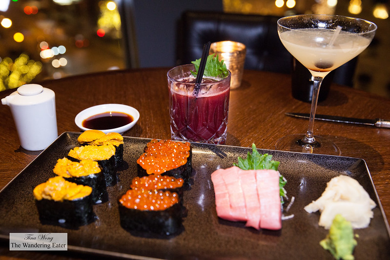 Our sushi selection (uni, ikura, and chutoro (fatty tuna)) with our cocktails