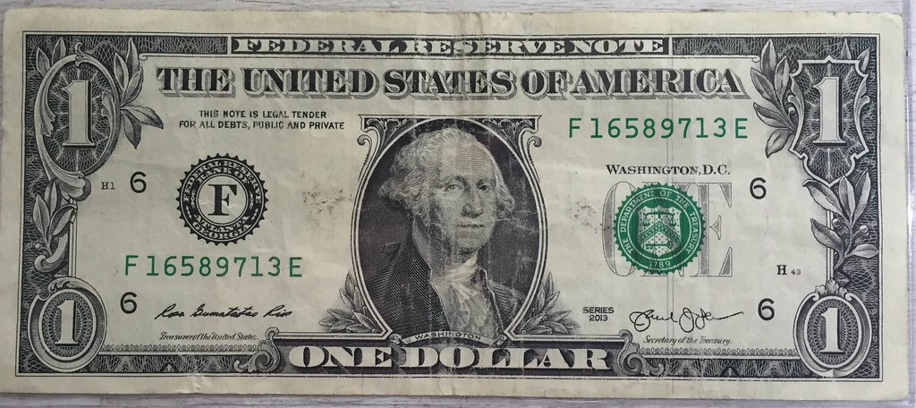 Dollar bill with vertical lines at right