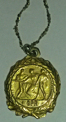 Vail medal necklace reverse