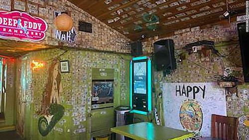 Tybee Island Sand Bar dollar bills on wall