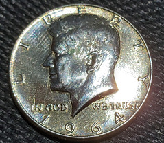 Counterfeit 1964 Kennedy Half Dollar obverse