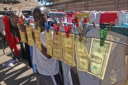 Repairing dollars in Zimbabwe