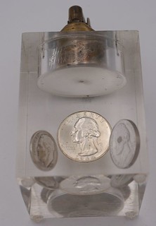 Coins in Lucite lighter